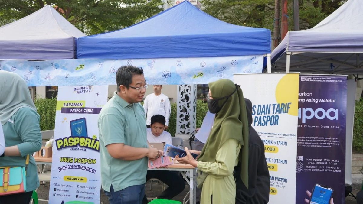 PASPORIA: Minggu Tetap Bisa Bikin Paspor, Imigrasi Blitar Hadir di CFD Tulungagung